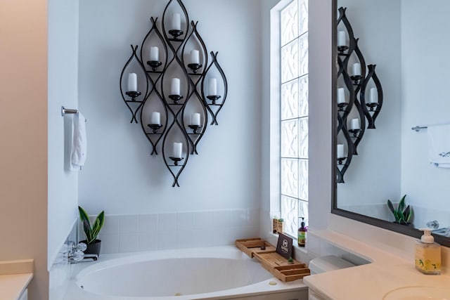 11355 SW Rockingham Dr, Port Saint Lucie, FL 34987 - full bath with vanity, plenty of natural light, and a garden tub