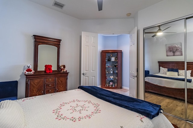 11355 SW Rockingham Dr, Port Saint Lucie, FL 34987 - bedroom featuring wood finished floors, a closet, and ceiling fan