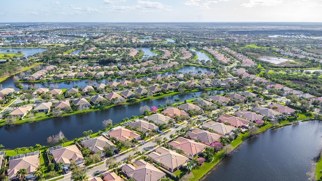 11355 SW Rockingham Dr, Port Saint Lucie, FL 34987 - aerial view of property's location with nearby suburban area and a large body of water