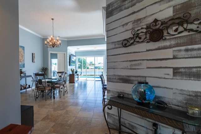11355 SW Rockingham Dr, Port Saint Lucie, FL 34987 - dining room featuring a chandelier and crown molding