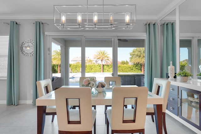 1120 Wandering Willow Way, Loxahatchee, FL 33470 - dining room featuring crown molding and light tile patterned floors
