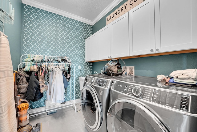 1120 Wandering Willow Way, Loxahatchee, FL 33470 - laundry room featuring washer and clothes dryer, crown molding, cabinet space, tile patterned floors, and a textured ceiling