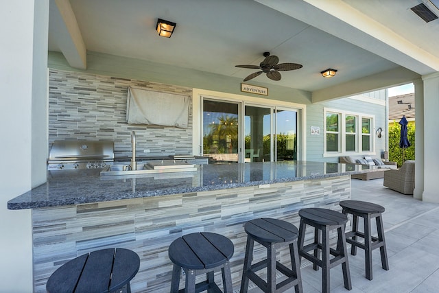 1120 Wandering Willow Way, Loxahatchee, FL 33470 - view of patio featuring an outdoor kitchen and ceiling fan
