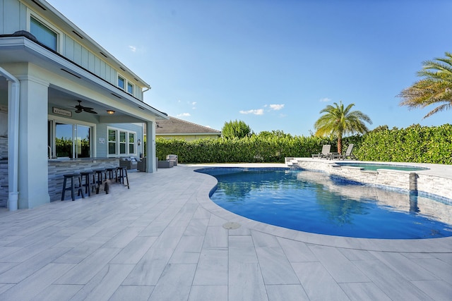1120 Wandering Willow Way, Loxahatchee, FL 33470 - view of swimming pool featuring ceiling fan, a patio area, and a pool with connected hot tub