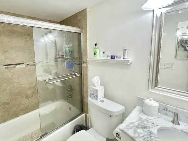 188 Upminster I Unit 188, Deerfield Beach, FL 33442 - bathroom with enclosed tub / shower combo and vanity