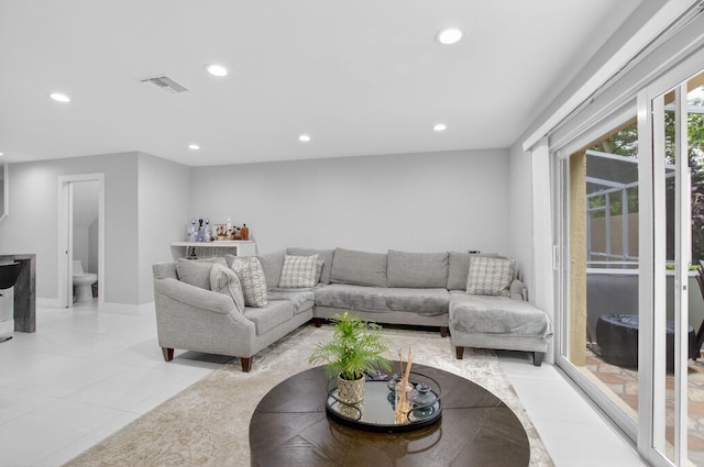 3469 Deer Creek Palladian Cir, Deerfield Beach, FL 33442 - living area featuring recessed lighting, a bar, and light tile patterned floors