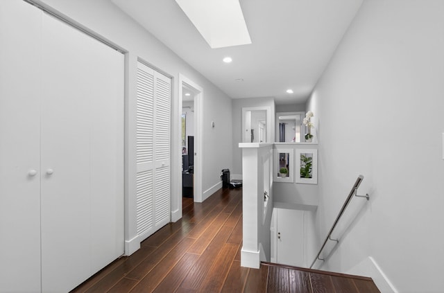 3469 Deer Creek Palladian Cir, Deerfield Beach, FL 33442 - corridor featuring an upstairs landing, recessed lighting, dark wood finished floors, and a skylight