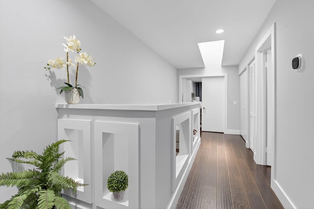 3469 Deer Creek Palladian Cir, Deerfield Beach, FL 33442 - corridor featuring recessed lighting, dark wood-style floors, and a skylight