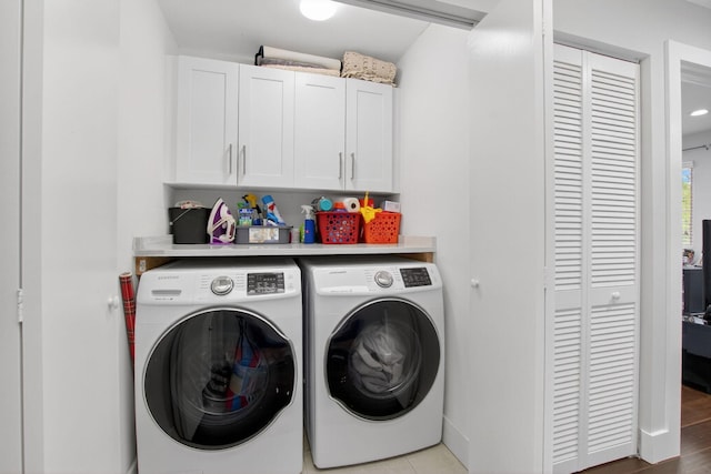 3469 Deer Creek Palladian Cir, Deerfield Beach, FL 33442 - laundry area featuring washing machine and dryer and cabinet space
