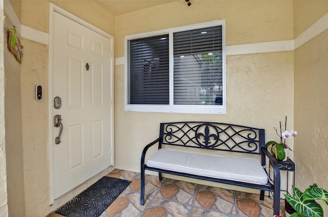 3469 Deer Creek Palladian Cir, Deerfield Beach, FL 33442 - view of exterior entry with stucco siding