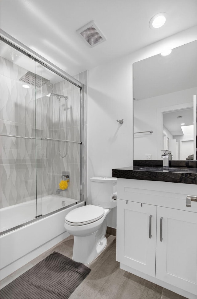 3469 Deer Creek Palladian Cir, Deerfield Beach, FL 33442 - full bath with vanity, bath / shower combo with glass door, and wood finished floors