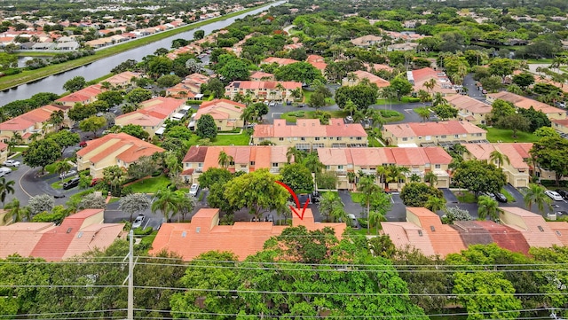 3469 Deer Creek Palladian Cir, Deerfield Beach, FL 33442 - aerial view of residential area with property boundaries highlighted and a large body of water