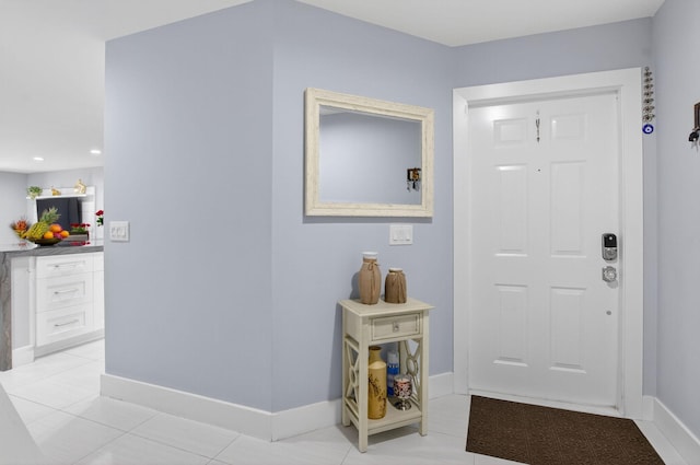 3469 Deer Creek Palladian Cir, Deerfield Beach, FL 33442 - entrance foyer with light tile patterned flooring and baseboards