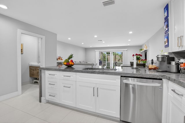 3469 Deer Creek Palladian Cir, Deerfield Beach, FL 33442 - kitchen with dishwasher, white cabinets, a peninsula, recessed lighting, and light tile patterned flooring