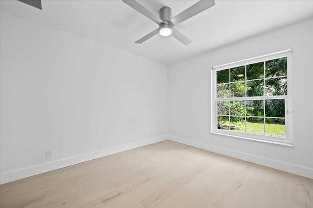 204 Clocktower Dr, Jupiter, FL 33458 - unfurnished room featuring light wood finished floors and ceiling fan