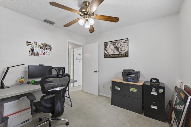 6093 Lucerne St, Jupiter, FL 33458 - home office featuring light carpet, a ceiling fan, and a textured ceiling