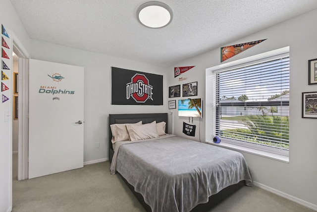 6093 Lucerne St, Jupiter, FL 33458 - bedroom featuring carpet floors and a textured ceiling