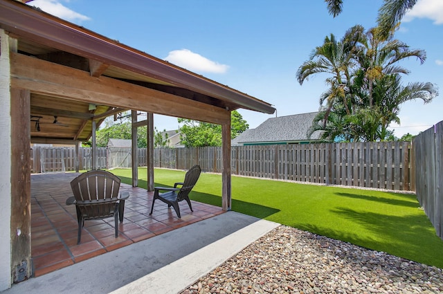 6093 Lucerne St, Jupiter, FL 33458 - fenced backyard featuring a patio area