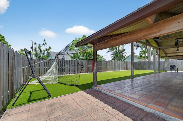6093 Lucerne St, Jupiter, FL 33458 - fenced backyard featuring a patio