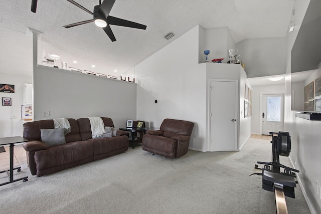 6093 Lucerne St, Jupiter, FL 33458 - living room with ceiling fan, light colored carpet, a textured ceiling, and high vaulted ceiling