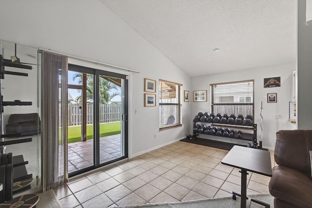 6093 Lucerne St, Jupiter, FL 33458 - entryway with a textured ceiling, tile patterned flooring, and high vaulted ceiling
