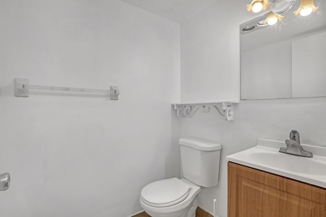 300 Village Green Cir S Unit 120, Palm Springs, FL 33461 - bathroom featuring vanity and toilet