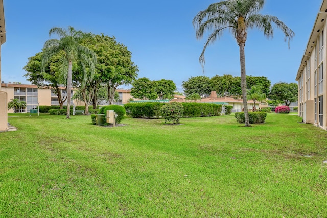 300 Village Green Cir S Unit 120, Palm Springs, FL 33461 - view of grassy yard