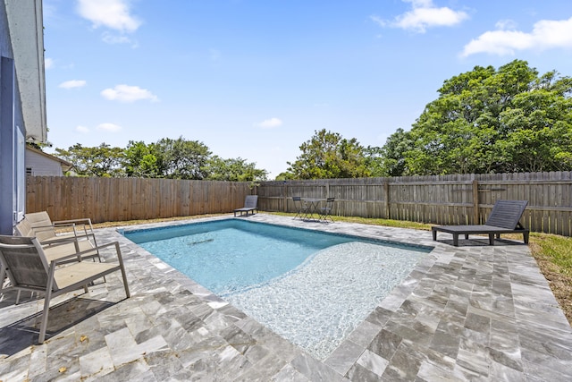 126 NW 6th Ave, Delray Beach, FL 33444 - view of swimming pool featuring a patio area and a fenced backyard