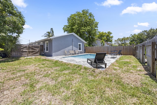 126 NW 6th Ave, Delray Beach, FL 33444 - fenced backyard with a patio area