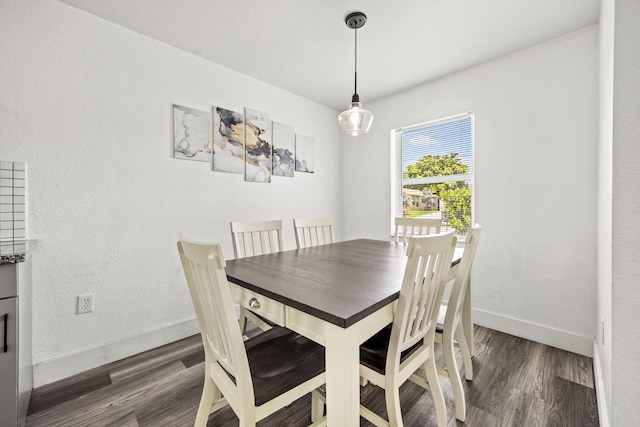126 NW 6th Ave, Delray Beach, FL 33444 - dining space featuring wood finished floors and baseboards