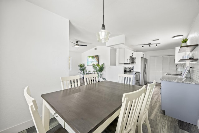 126 NW 6th Ave, Delray Beach, FL 33444 - dining area featuring dark wood finished floors, ceiling fan, and lofted ceiling