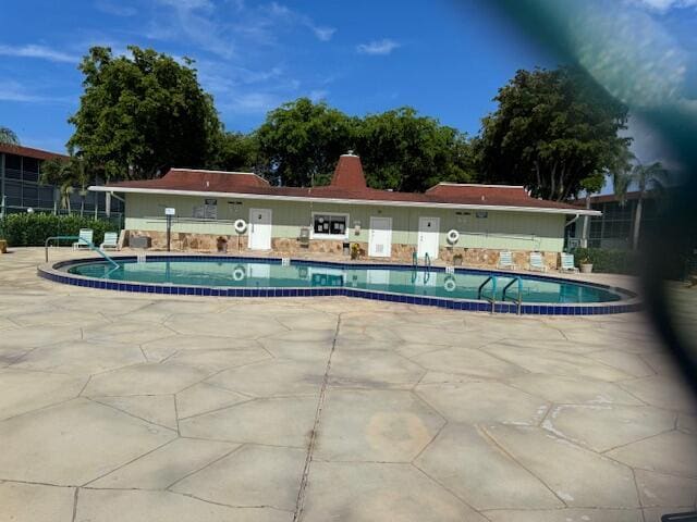 3000 Springdale Blvd Unit V204, Palm Springs, FL 33461 - community pool with a patio