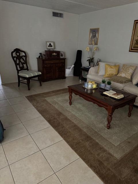 3000 Springdale Blvd Unit V204, Palm Springs, FL 33461 - living area with light tile patterned floors