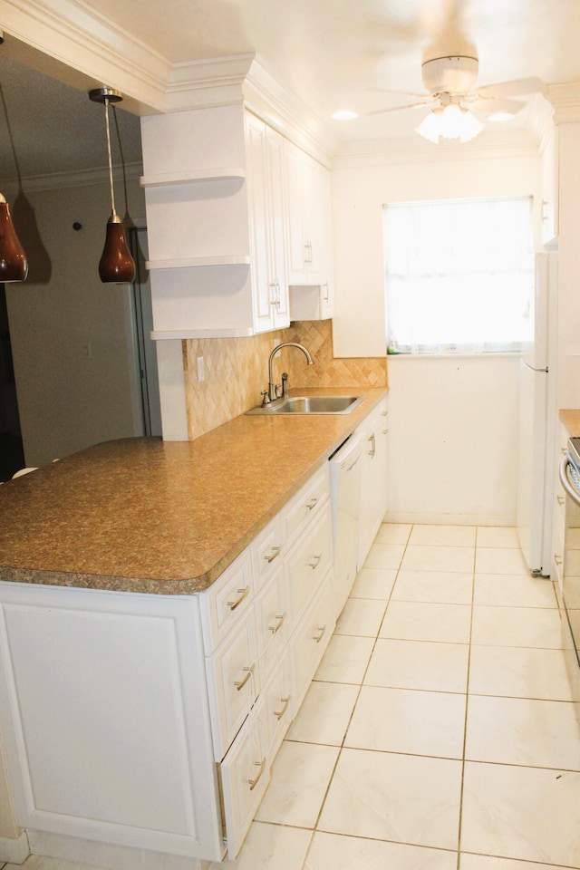 455 High Point Blvd Unit D, Delray Beach, FL 33445 - kitchen with white appliances, crown molding, a ceiling fan, backsplash, and light tile patterned floors