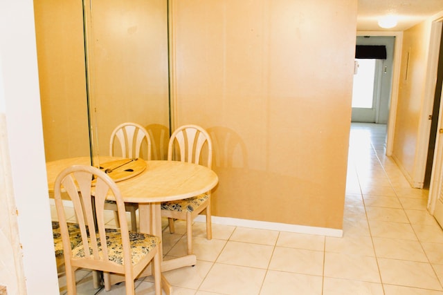 455 High Point Blvd Unit D, Delray Beach, FL 33445 - dining area with light tile patterned flooring and baseboards