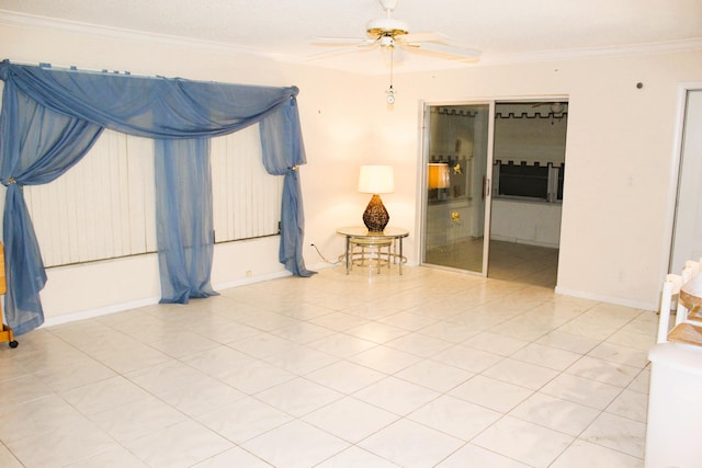 455 High Point Blvd Unit D, Delray Beach, FL 33445 - tiled spare room with a ceiling fan and ornamental molding