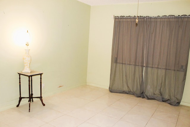 455 High Point Blvd Unit D, Delray Beach, FL 33445 - unfurnished room with tile patterned floors and baseboards