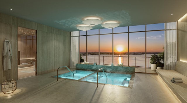 550 S Australian Ave Unit 2206, West Palm Beach, FL 33401 - pool at dusk with a water view