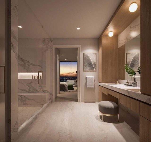 550 S Australian Ave Unit 2206, West Palm Beach, FL 33401 - bathroom featuring vanity, a marble finish shower, and recessed lighting