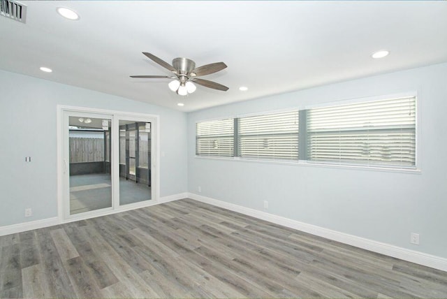 3580 Dunes Rd, Palm Beach Gardens, FL 33410 - spare room with ceiling fan, wood finished floors, and recessed lighting