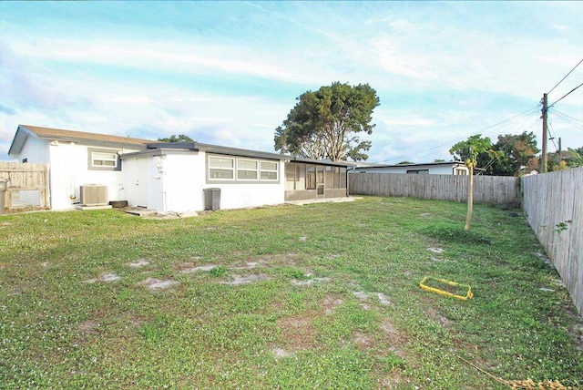3580 Dunes Rd, Palm Beach Gardens, FL 33410 - fenced backyard featuring a sunroom