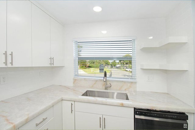3580 Dunes Rd, Palm Beach Gardens, FL 33410 - kitchen with dishwasher, white cabinets, open shelves, decorative backsplash, and light stone counters