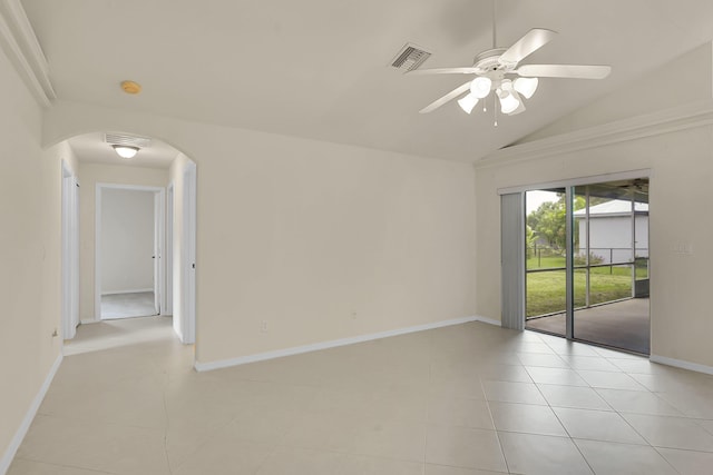 3601 SW Europe St, Port Saint Lucie, FL 34953 - unfurnished room with arched walkways, a ceiling fan, light tile patterned flooring, and vaulted ceiling