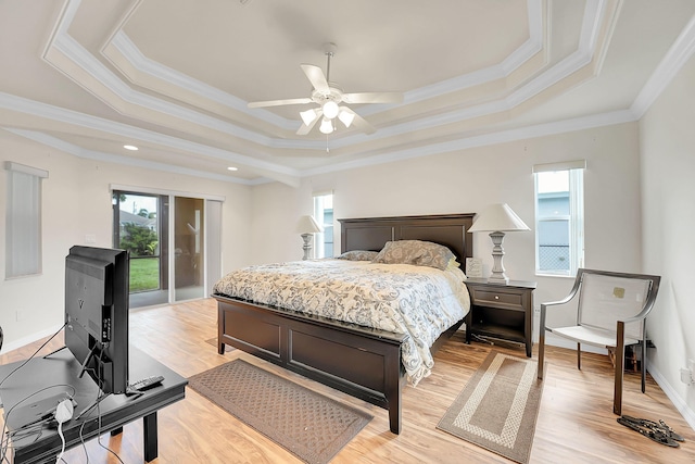 3601 SW Europe St, Port Saint Lucie, FL 34953 - bedroom featuring multiple windows, light wood finished floors, and crown molding