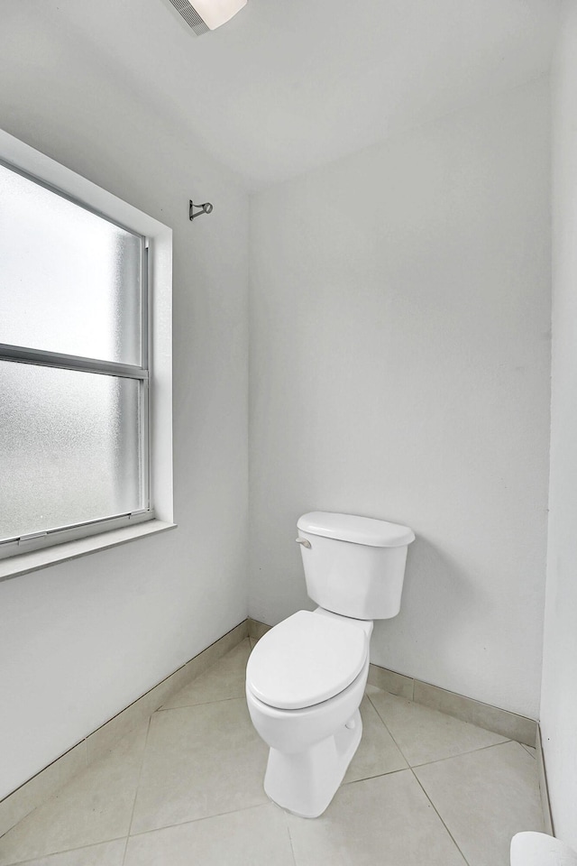 3601 SW Europe St, Port Saint Lucie, FL 34953 - bathroom with toilet and tile patterned flooring