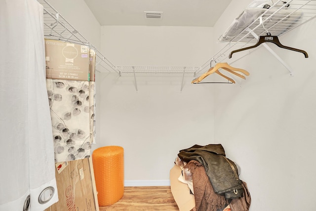 3601 SW Europe St, Port Saint Lucie, FL 34953 - walk in closet featuring wood finished floors