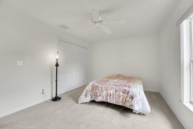 3601 SW Europe St, Port Saint Lucie, FL 34953 - bedroom featuring light carpet and a ceiling fan