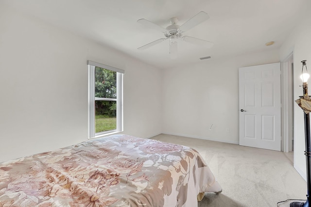 3601 SW Europe St, Port Saint Lucie, FL 34953 - bedroom featuring light carpet and a ceiling fan