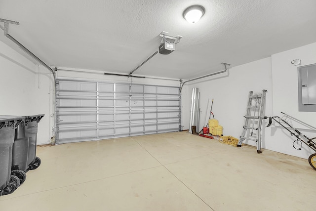 3601 SW Europe St, Port Saint Lucie, FL 34953 - garage featuring electric panel and a garage door opener