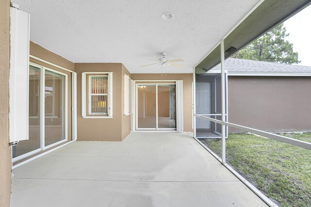 3601 SW Europe St, Port Saint Lucie, FL 34953 - unfurnished sunroom featuring a ceiling fan